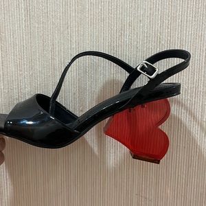Patent leather Lucite heart heel sandals